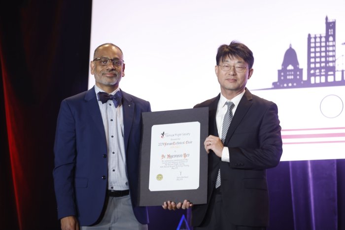 Dr. Yeo and Dr. Bhagwat at Forum-80